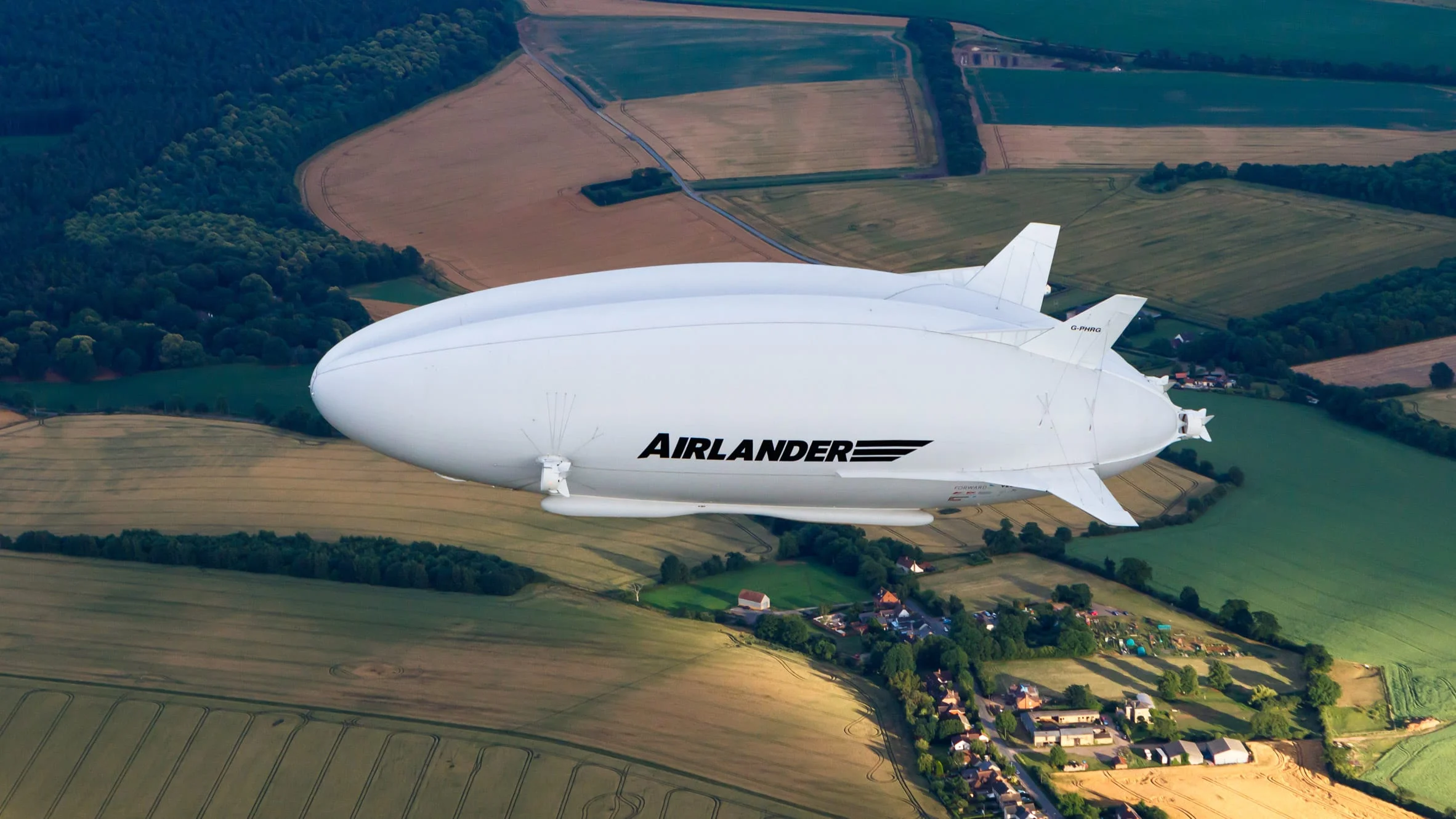 picture of a blimp flying over cambridge 